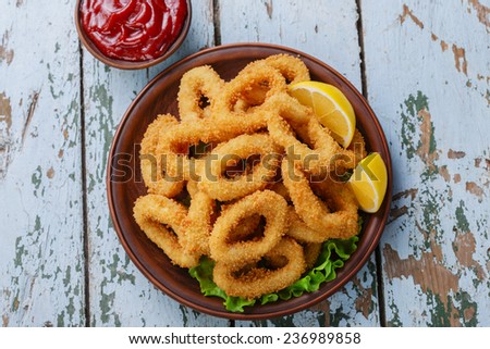 fried squid rings breaded with lemon