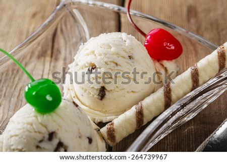 white ball of ice cream with chocolate chips