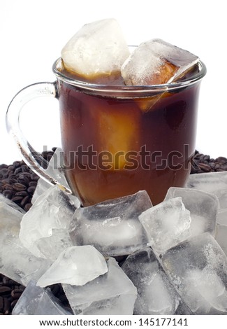 Iced coffee on bed of beans with ice