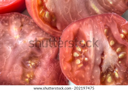 The tomato is the edible, often red fruit/berry of the nightshade Solanum lycopersicum heirloom tomato