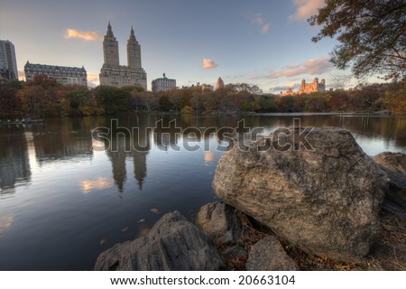 Upper West side of Manhattan as seen from Central Park in front of large boulder