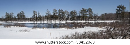 Panoramic winter scene of rural maine in winter