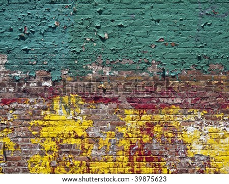 A old building wall with fading and chipping paint in New York City
