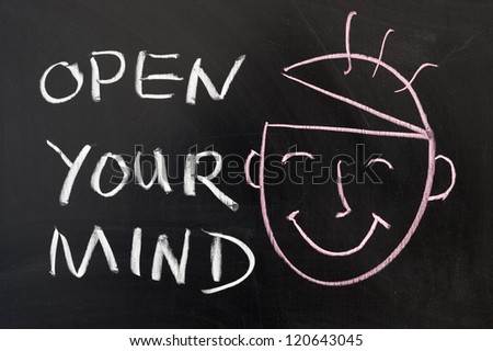 Open your mind concept chalk drawing on the blackboard