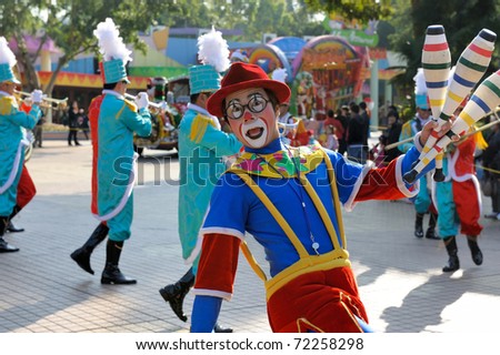 GUANGZHOU, CHINA - DEC 26: An unidentified clown performs in the christmas celebration of Changlong theme park on December 26, 2010 in Guangzhou city,China