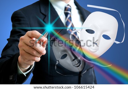 Business man your pen for creative the dramatic human face in the world business. White and back mask for show case concept ,good and bad businessman.