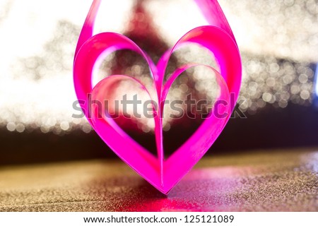 Paper sweet heart rolling on valentine day.