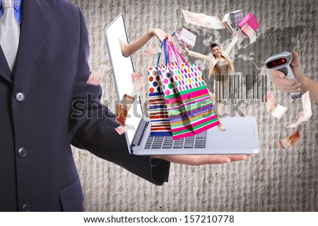 Business show shopping concept with his laptop for welcome to new year
