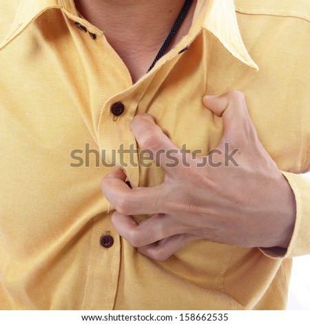 Heart Attack ,Use hand grabbing a chest with white background
