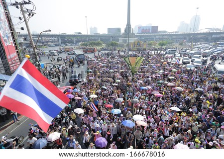 BANGKOK - DEC 9: Many 5 milion people walked for anti government corruption on Jun 09, 2013 in Bangkok, Thailand. The protesters required  Yingluck Shinawatra Prime Minister resign.