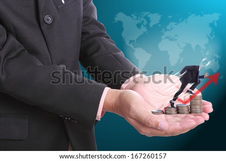 Businessman hold money and lamp business jump over the target