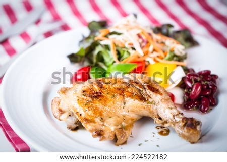 Grilled chicken steak western food style with salad vegetable