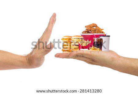 Hand refusing junk food with white background