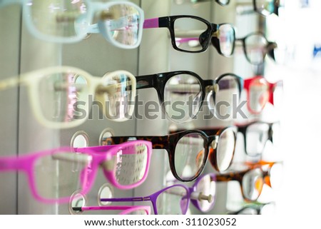 Glasses shop hang show colorful for customer select.