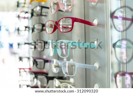 Glasses shop hang show colorful for customer select.