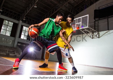 basketball players competition game sport in stadium.
