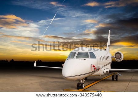 Jet airplane stop for wait VIP passenger on runway.