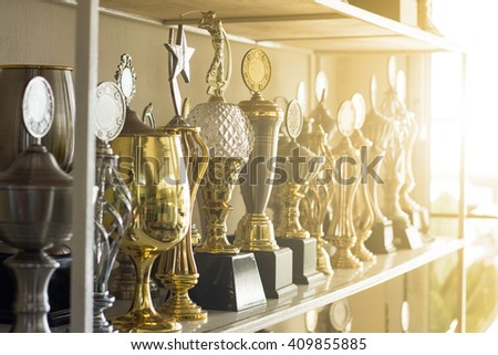 Trophy awards for champion leadership in tournament