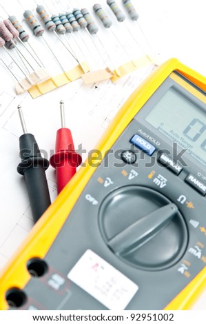 Checking Circuit by Multi-Meter. Electrical Engineer on during checking circuit board unit by Multi-Merer