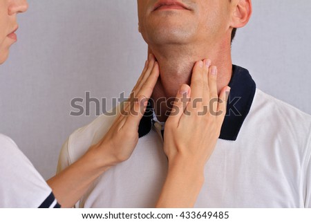 Man getting thyroid gland control. Health care and medical concept