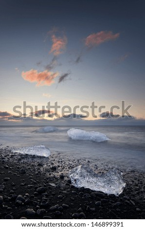 Blocks of ice float in a Jokursarlon beach in south Iceland.