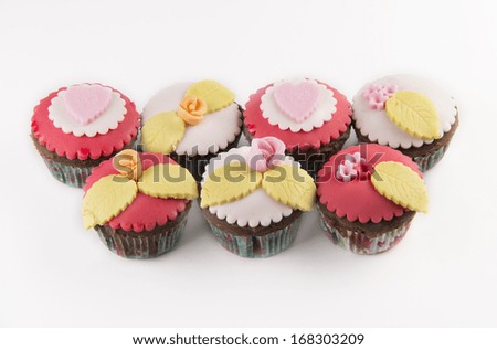Five  cupcakes isolated on white background
