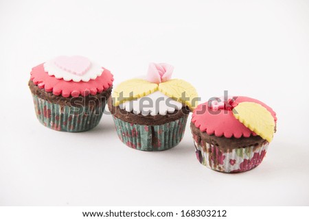 Three  cupcakes isolated on white background