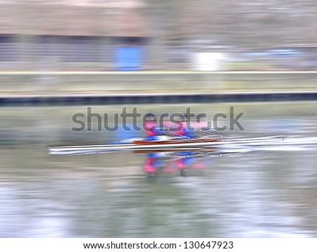 Two men in a row boat with panning and motion blur effect. Zwei Männer in einem Boot, Ruderer in einem Ruderboot mit Bewegungsunschärfe.