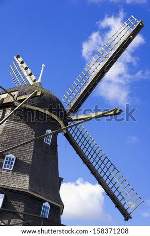 Wind Mill - Upper part with wings of an old historic windmill, Kullen Peninsula, Sweden.