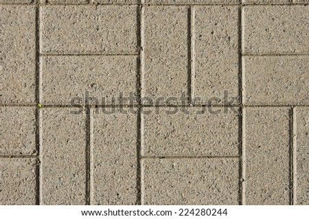 Concrete Stone Pattern Tiles Background - Pattern of rectangular promenade tiles of concrete.