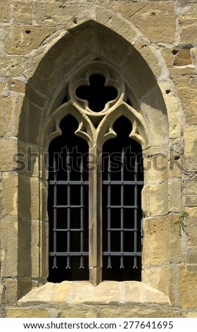 Gothic Window - Gothic medieval window with tracery in a wall opening.