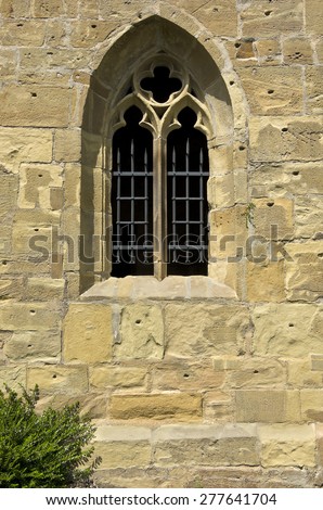 Gothic Window - Gothic medieval window with tracery in a wall opening.