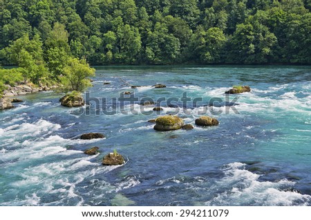 River Landscape - River landscape with rapids upstream the Rhine Falls, Schaffhausen, Switzerland.