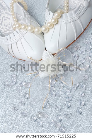 stock photo wedding shoes with pearls and crystals on silver background