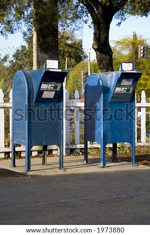 Shot of two mailboxes.