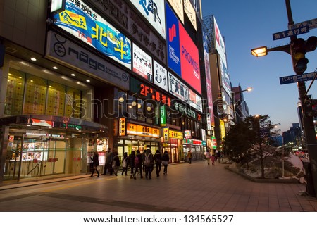 SAPPORO, JAPAN - MARCH 27 : Night scene of commercial buildings located at Susukino district on March 27, 2013 in Sapporo, Hokkaido, Japan.Susukino is one of the major red-light districts in Japan.