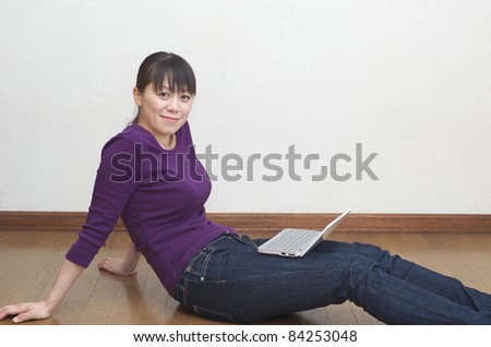 Asian woman with laptop computer