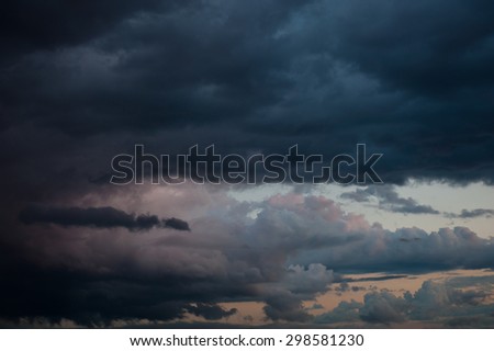 black clouds on sunset