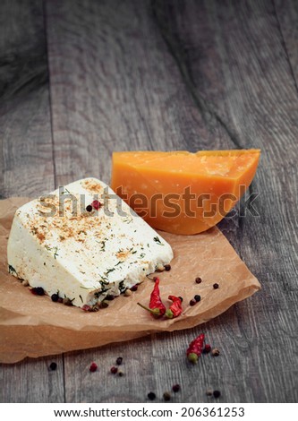 Two kinds of cheese  on the wooden table