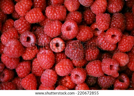 Background with sweet ripe red raspberries
