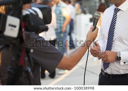 TV interview with a businessman