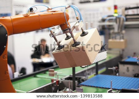 Robotic arm for packing