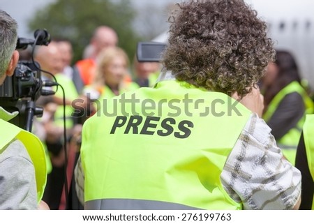 Covering an media event with a video camera