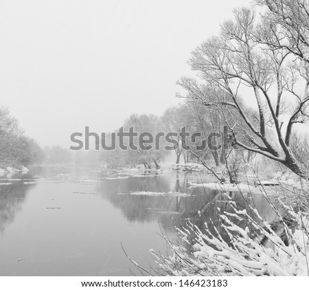 winter river, when it is snowing