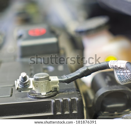 Cables connect to a car battery