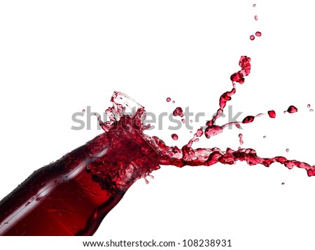 Red juice splash from a bottle