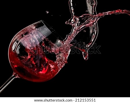 Red wine splash on black background
