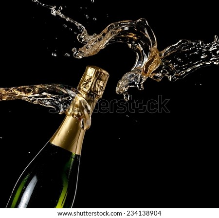 Champagne bottle splash, close up