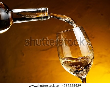 White wine pouring