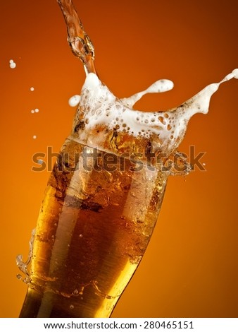Beer glass splash, close up